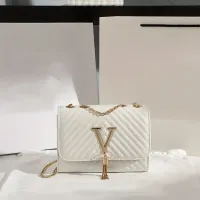 Sequined Tassel Crossbody Clutch thumbnail 1